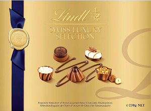 Конфеты LINDT SWISS LUXURY SELECTION Швейцарская Роскошь ассорти из молочного, темного и белого шоколада с начинками /картон/ 230г*6
