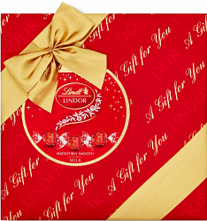Конфеты LINDT LINDOR молочный MILK LAIT, красная подарочная с бантом плоская /картон/ 287г*12