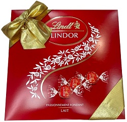 Конфеты LINDT LINDOR молочный MILK LAIT, красная подарочная с бантом плоская /картон/ 287г*12