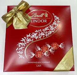 Конфеты LINDT LINDOR молочный MILK LAIT, красная подарочная с бантом плоская /картон/ 287г*12