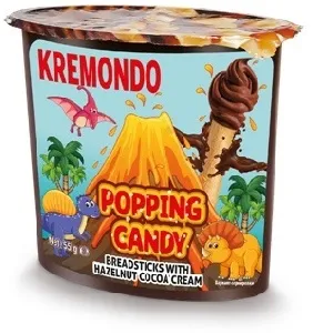 Паста KREMONDO ореховая с какао и взрывной карамелью +хлебные палочки (шоубокс 55г*24шт) /пластик/ 55г*96