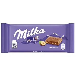 Шоколад MILKA молочный с дробленым орехом Hazelnuts 90г*24